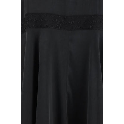 Dress by Ganni for women in viscose silk black features an cute silhouette, detailed with a and that elegantly flows into a cute maxi long.