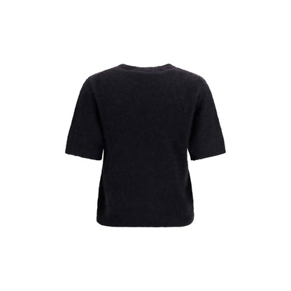 T-Shirt by Ganni for women in polyamide merino & alpaca wool black & signature showcases a chic silhouette, artfully detailed with a chic round neckline and for a chic finish.