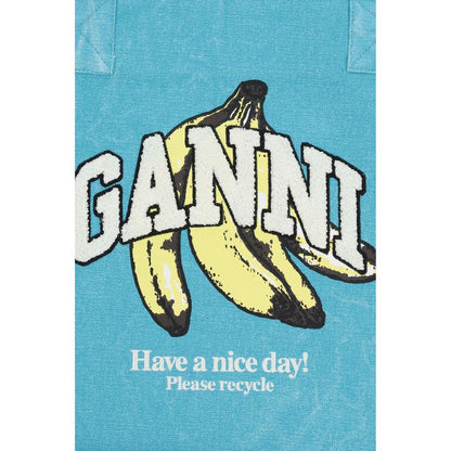 Medium Tote Shoulder Bag by Ganni for women in cotton blue, signature & print features an effortlessly chic silhouette with a secure zipper, ample single-compartment, and versatile handle for effortlessly chic everyday luxury.