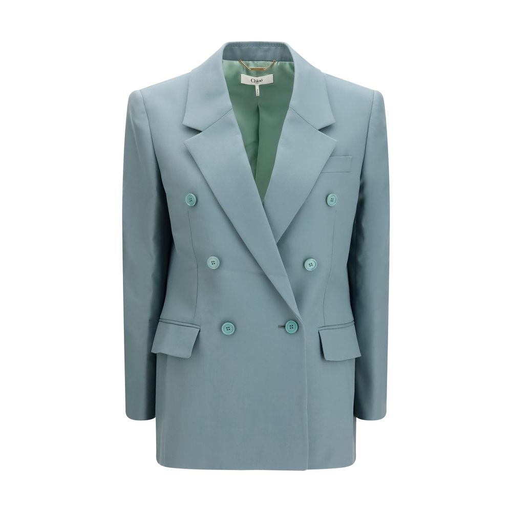 This Blazer by Chloé for women in merino wool bicolour presents a tailored silhouette, meticulously tailored with a tailored v-neck lapel peak-lapel neckline and distinctive for a tailored finish.