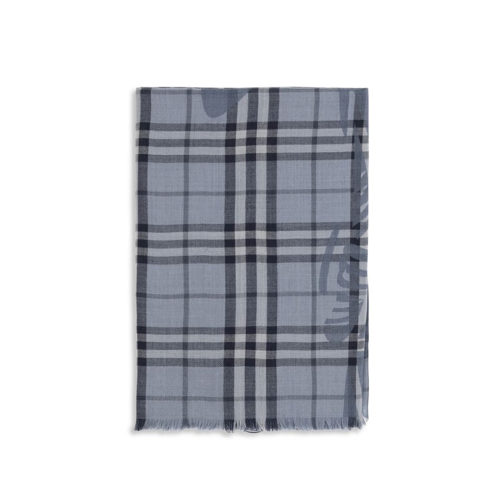 Scarf by Burberry for women in wool & silk blue & jacquard showcases a eye catching silhouette, artfully capturing the essence of the eye catching Wool & Silk Foulard Scarf design for a sophisticated look.