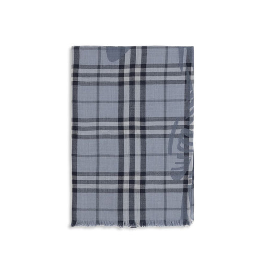 Scarf by Burberry for women in wool & silk blue & jacquard showcases a eye catching silhouette, artfully capturing the essence of the eye catching Wool & Silk Foulard Scarf design for a sophisticated look.
