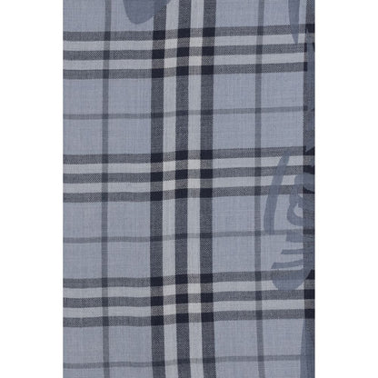 Scarf by Burberry for women in wool & silk blue & jacquard features a timeless silhouette, artfully capturing the essence of the timeless Wool & Silk Foulard Scarf design for a sophisticated look.