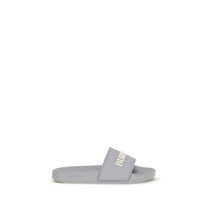 Flat Shoes by Burberry for men in rubber gray features an ergonomic silhouette, perfectly showcasing Men's Rubber Flat Shoes with its distinct flat and elegant .
