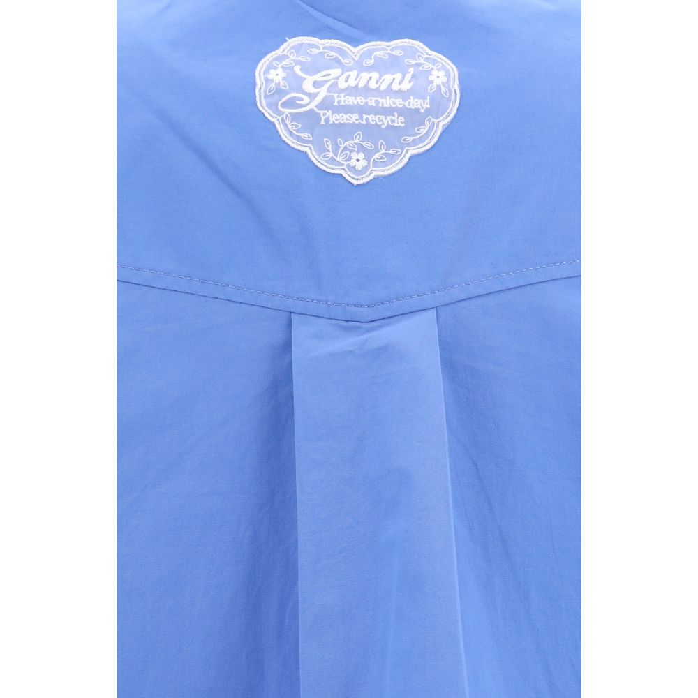 Shirt by Ganni for women in stretch cotton blue & patterned showcases a sleek silhouette, elegantly detailed with a sleek and for a sleek finish.