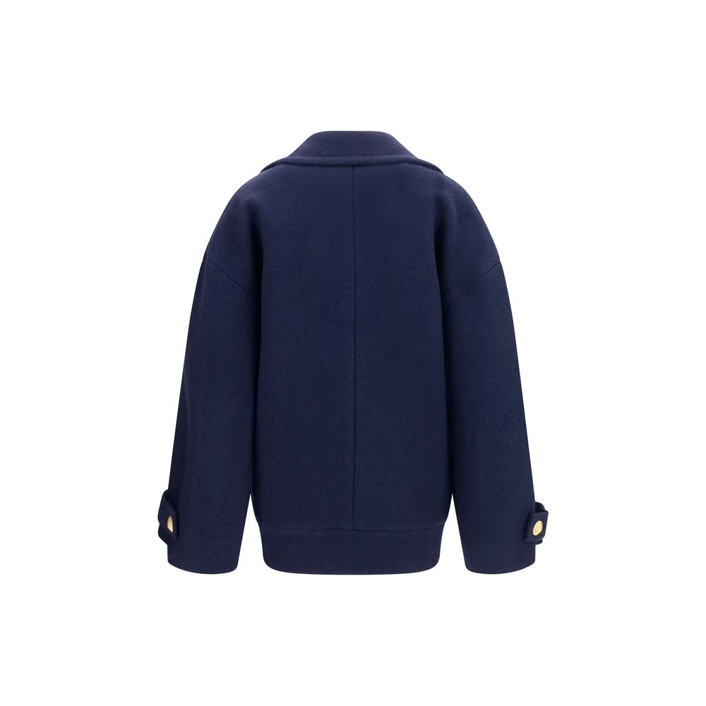 Overcoat by Balmain for women in merino wool blue & gold presents a luxurious silhouette, showcasing a luxurious v-neck lapel peak-lapel neckline and sophisticated for a premium, luxurious look.