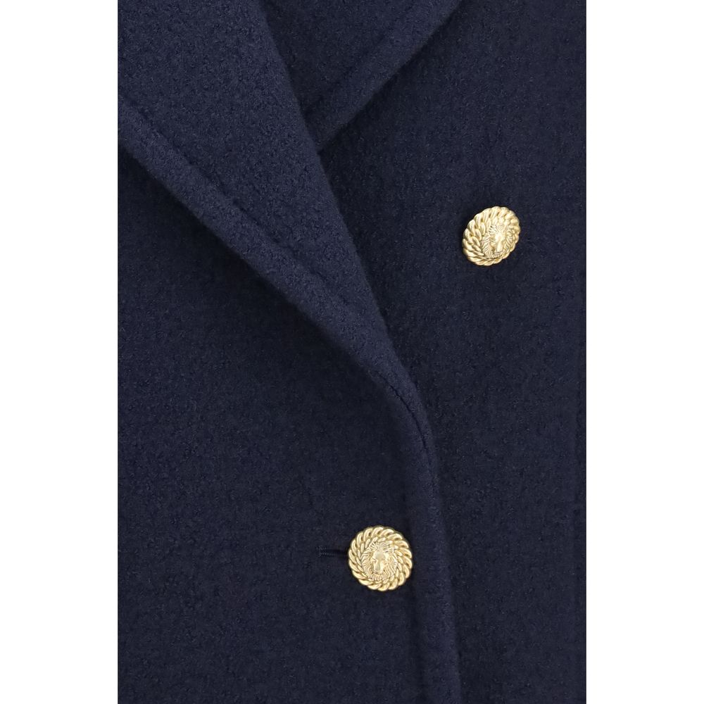 Overcoat by Balmain for women in merino wool blue & gold presents a luxurious silhouette, showcasing a luxurious and sophisticated for a premium, luxurious look.