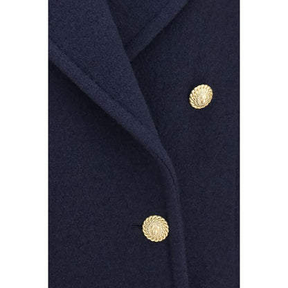 Overcoat by Balmain for women in merino wool blue & gold presents a luxurious silhouette, showcasing a luxurious and sophisticated for a premium, luxurious look.