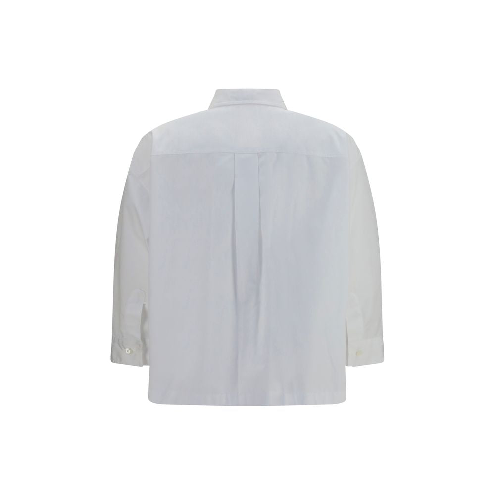 Dress Shirt by Brunello Cucinelli for women in cotton white showcases a sleek silhouette, elegantly detailed with a sleek and for a sleek finish.
