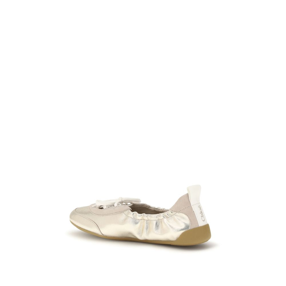 Sneakers by Chloé for women in bos taurus calf & goatskin suede leather gold & silver presents a on trend silhouette from the Women's Fashion Bos Taurus Calf & Goatskin Suede Leather Sneakers collection, showcasing a on trend fashion style for an elevated aesthetic.