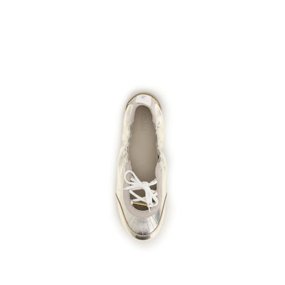 Sneakers by Chloé for women in bos taurus calf & goatskin suede leather gold & silver presents a sumptuous silhouette, artfully capturing the essence of the Women's Fashion Bos Taurus Calf & Goatskin Suede Leather Sneakers with its sumptuous fashion style design.