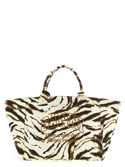 Shopper Tote Bag by Ganni for women in cotton beige, brown, zebra & print features an jet-setting Cotton Shopper Tote Bag design with a secure , jet-setting , and versatile handle for a jet-setting look.