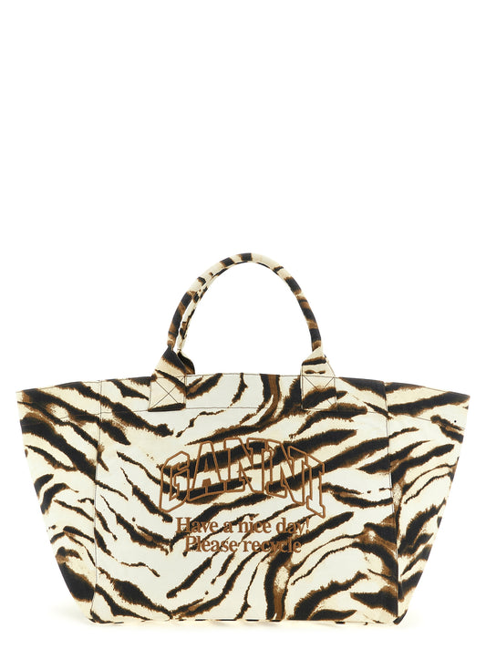 Shopper Tote Bag by Ganni for women in cotton beige, brown, zebra & print features an jet-setting Cotton Shopper Tote Bag design with a secure , jet-setting , and versatile handle for a jet-setting look.