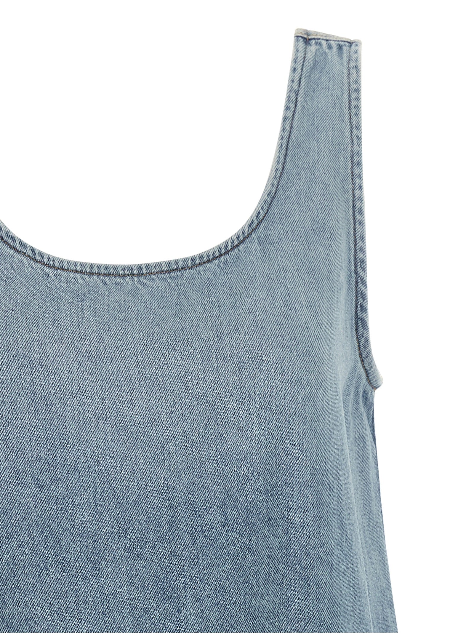 Dress by Ganni for women in organic cotton denim light-blue & signature features a dramatic silhouette, showcasing an elegant round neckline and that flows into a dramatic short mini.