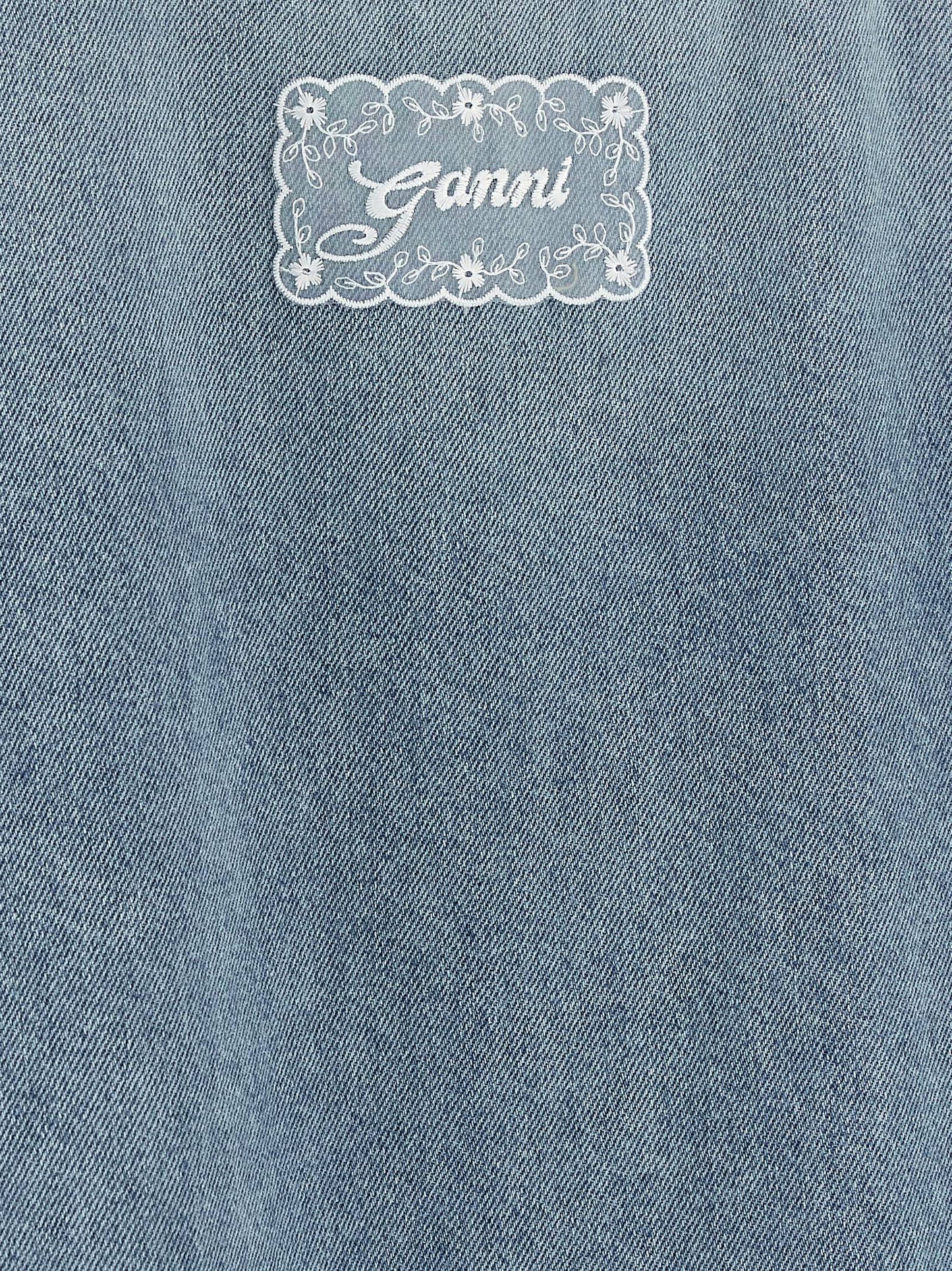 Dress by Ganni for women in organic cotton denim light-blue & signature features an magnificent silhouette, artfully detailed with a magnificent and that flows into an magnificent short mini.