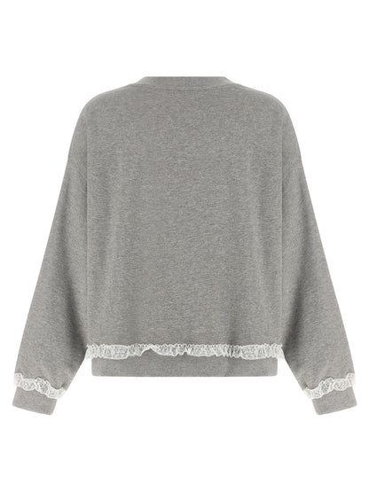 Activewear Sweatshirt by Ganni for women in organic cotton gray showcases a versatile silhouette, artfully detailed with a versatile round neckline and for a versatile finish with .
