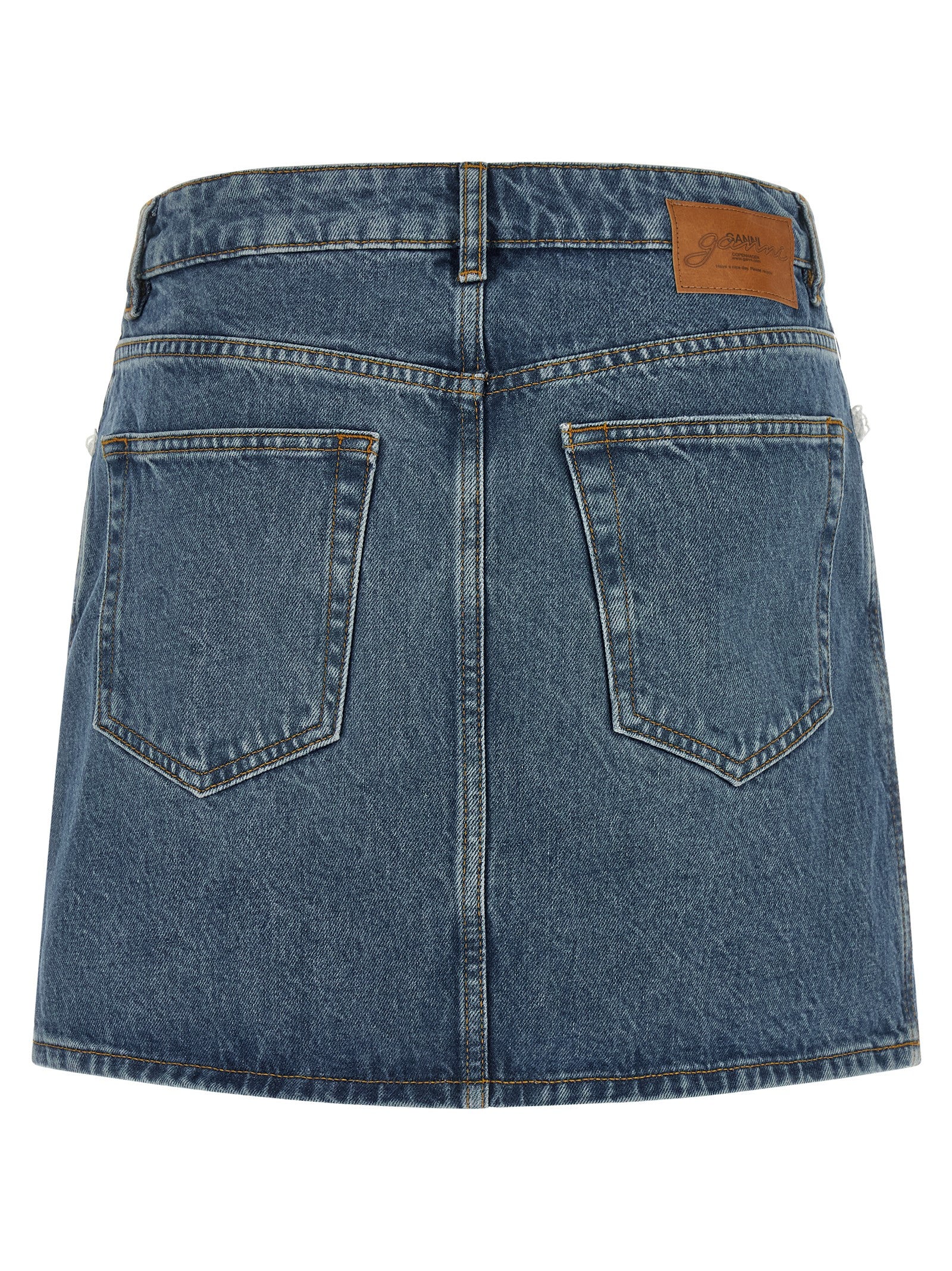 Skirt by Ganni for women in denim cotton blue, brown & white features an relaxed-yet-refined silhouette that elegantly showcases the Women's Denim Cotton Skirt design and sophisticated mini long.