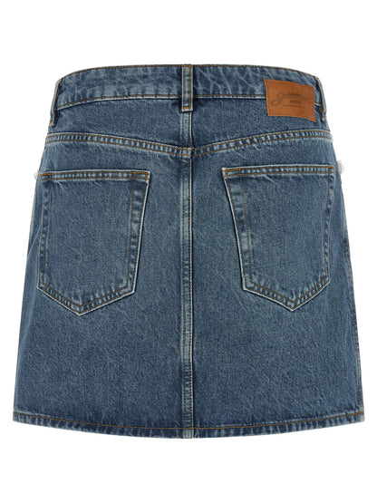 Skirt by Ganni for women in denim cotton blue, brown & white features an relaxed-yet-refined silhouette that elegantly showcases the Women's Denim Cotton Skirt design and sophisticated mini long.