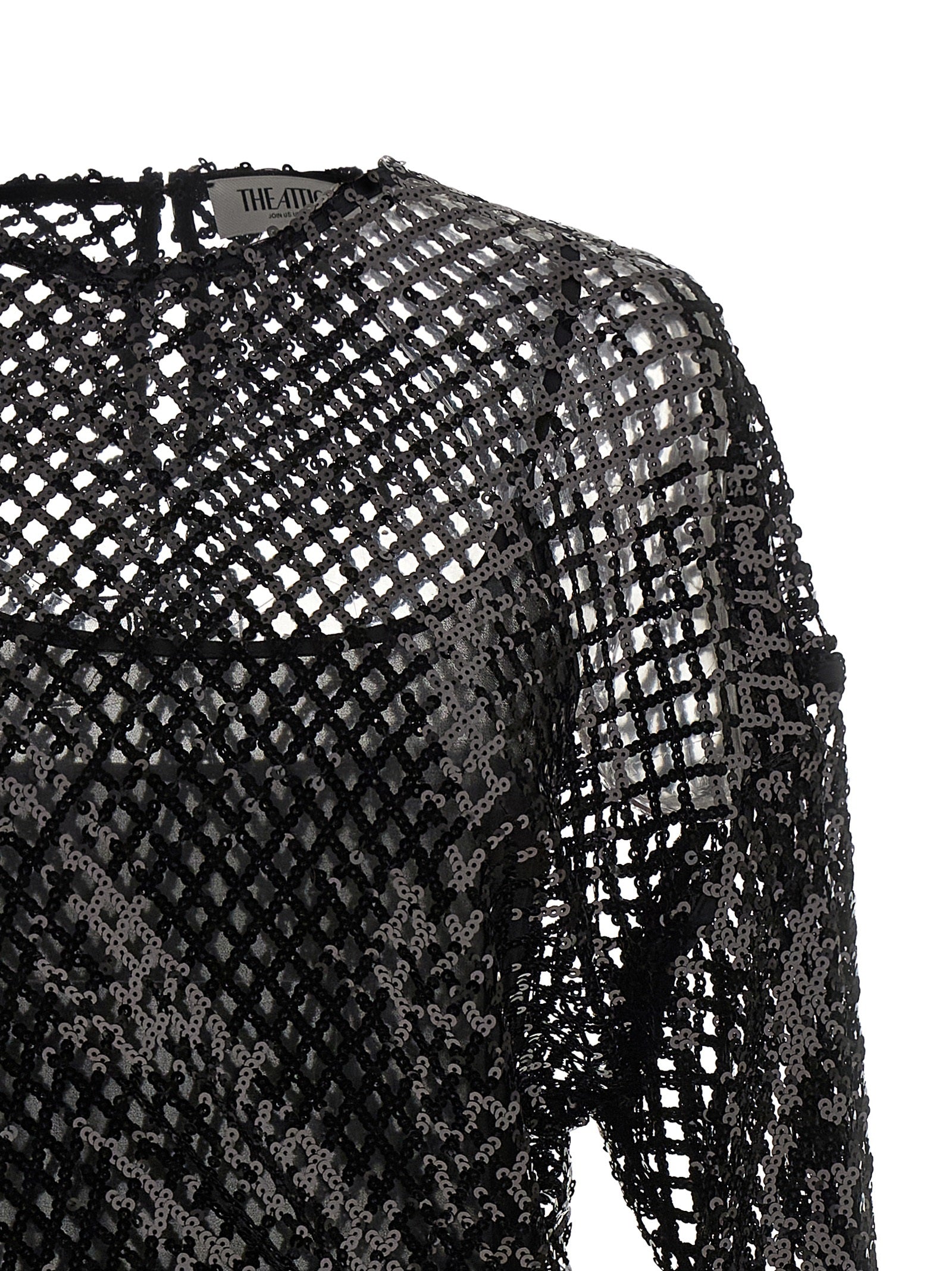 Dress by The Attico for women in polyester sequins black & transparent features an cute silhouette, detailed with a and crew split neckline that elegantly flows into a cute short mini.