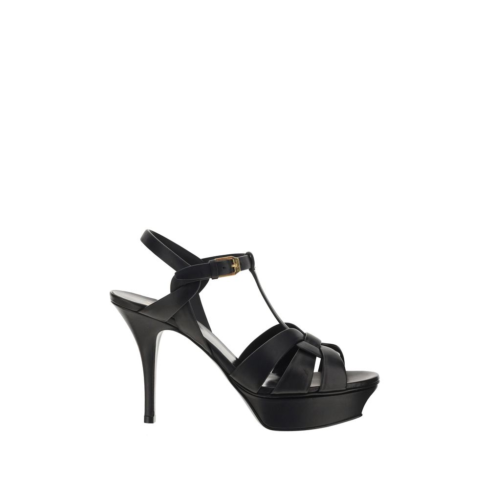 Platform Stiletto Ankle Strap Cage Sandals by Saint Laurent for women in bos taurus calf leather black features an exquisite silhouette, showcasing the exquisite Women's Bos Taurus Calf Leather Platform Stiletto Ankle Strap Cage Sandals with a stiletto platform and almond toe style.