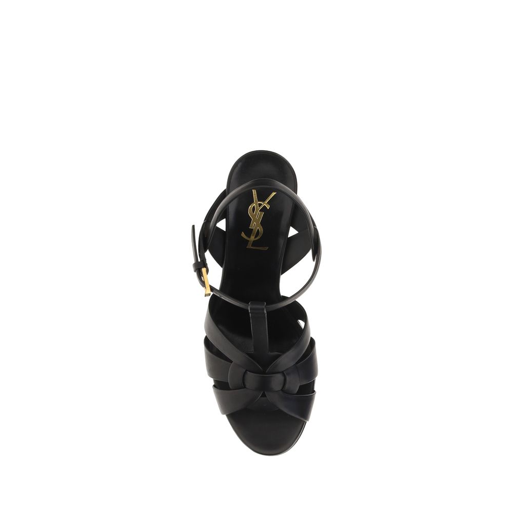 Platform Stiletto Ankle Strap Cage Sandals by Saint Laurent for women in bos taurus calf leather black features an architectural design from the Women's Bos Taurus Calf Leather Platform Stiletto Ankle Strap Cage Sandals collection, defined by a architectural stiletto platform and almond toe style for a architectural finish.