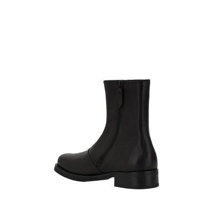 Ankle Winter Boots by Our Legacy for men in bos taurus calf leather black features an avant-garde Men's Bos Taurus Calf Leather Ankle Winter Boots silhouette, defined by a sophisticated block-heel and a avant-garde .