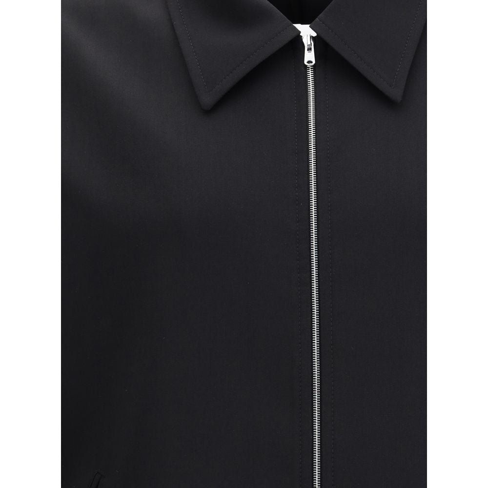 This Jacket by Our Legacy for men in wool black showcases a magnificent silhouette, meticulously crafted with a distinctive and functional pockets for a magnificent finish.