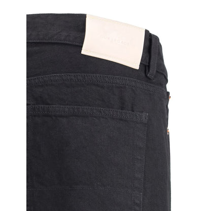 Jeans by Our Legacy for men in cotton denim black features a polished silhouette with a polished straight-leg, relaxed-fit, regular-fit & wide, reaching a polished long and finished with a polished .