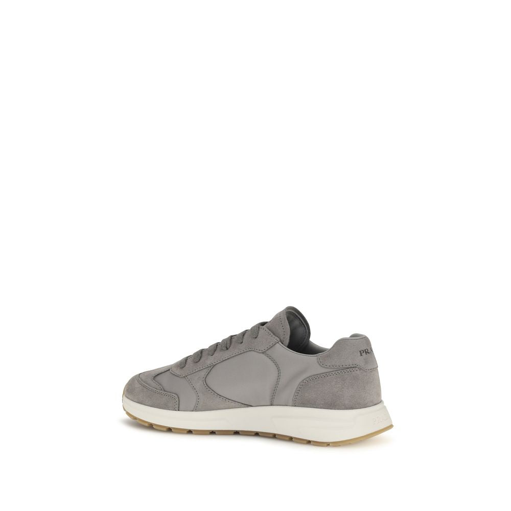 Athletic Sneakers by Prada for men in nylon polyamide leather gray presents a sleek silhouette, perfectly capturing the athletic style essence of Men's Athletic Nylon Polyamide Leather Sneakers with its sleek design and premium finish.