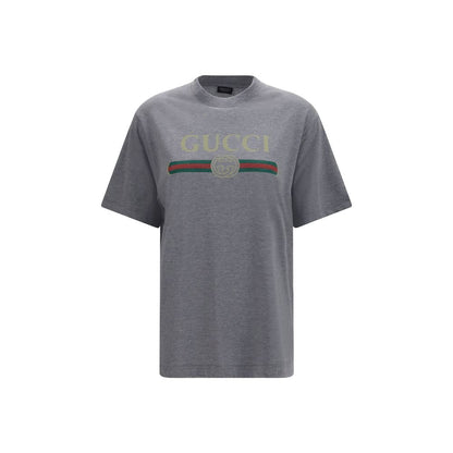 T-Shirt by Gucci for women in cotton & silk gray, white & print showcases a chic silhouette, artfully detailed with a chic crew neckline and short-sleeve for a chic finish.