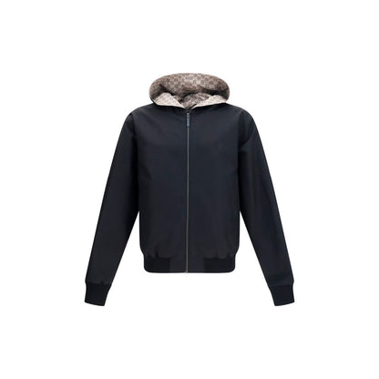 Hooded Jacket by Gucci for men in nylon cotton polyester black & brown presents a authentic silhouette, artfully detailed with a authentic hooded neckline and functional pockets & hooded for a premium authentic finish.