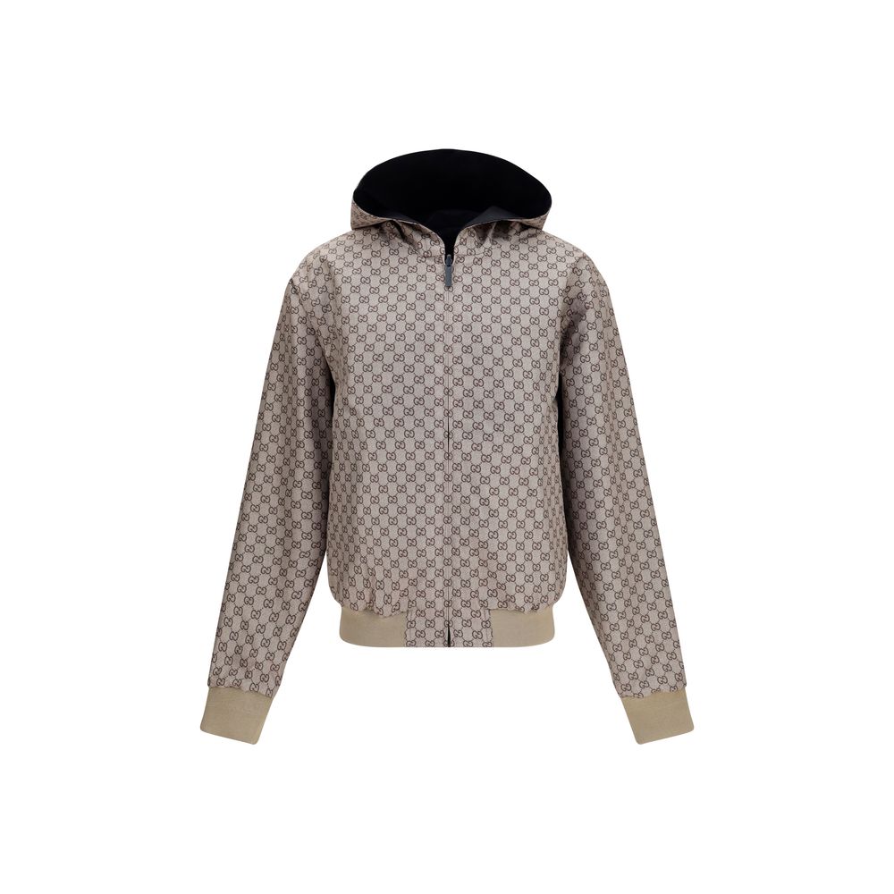 Hooded Jacket by Gucci for men in nylon cotton polyester black & brown showcases a contemporary silhouette, detailed with a contemporary hooded neckline and premium pockets & hooded for a sophisticated finish.
