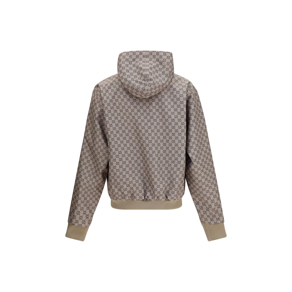 Hooded Jacket by Gucci for men in nylon cotton polyester black & brown features a smart silhouette, perfectly accentuated by its unique hooded neckline and functional pockets & hooded for a smart finish.