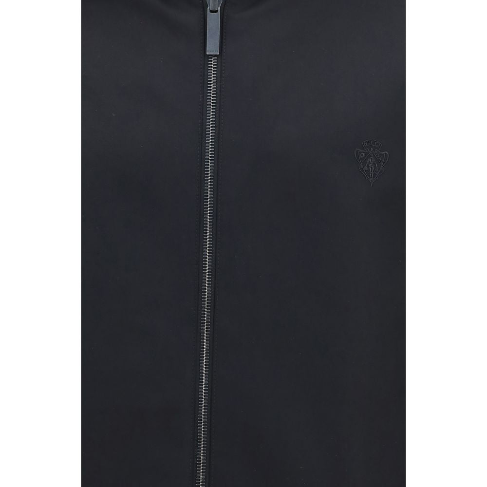 Hooded Jacket by Gucci for men in nylon cotton polyester black & brown features an utilitarian silhouette with a refined hooded neckline, showcasing sophisticated pockets & hooded for an utilitarian aesthetic.