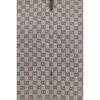This Hooded Jacket by Gucci for men in nylon cotton polyester black & brown showcases a magnificent silhouette, meticulously crafted with a distinctive and functional pockets & hooded for a magnificent finish.