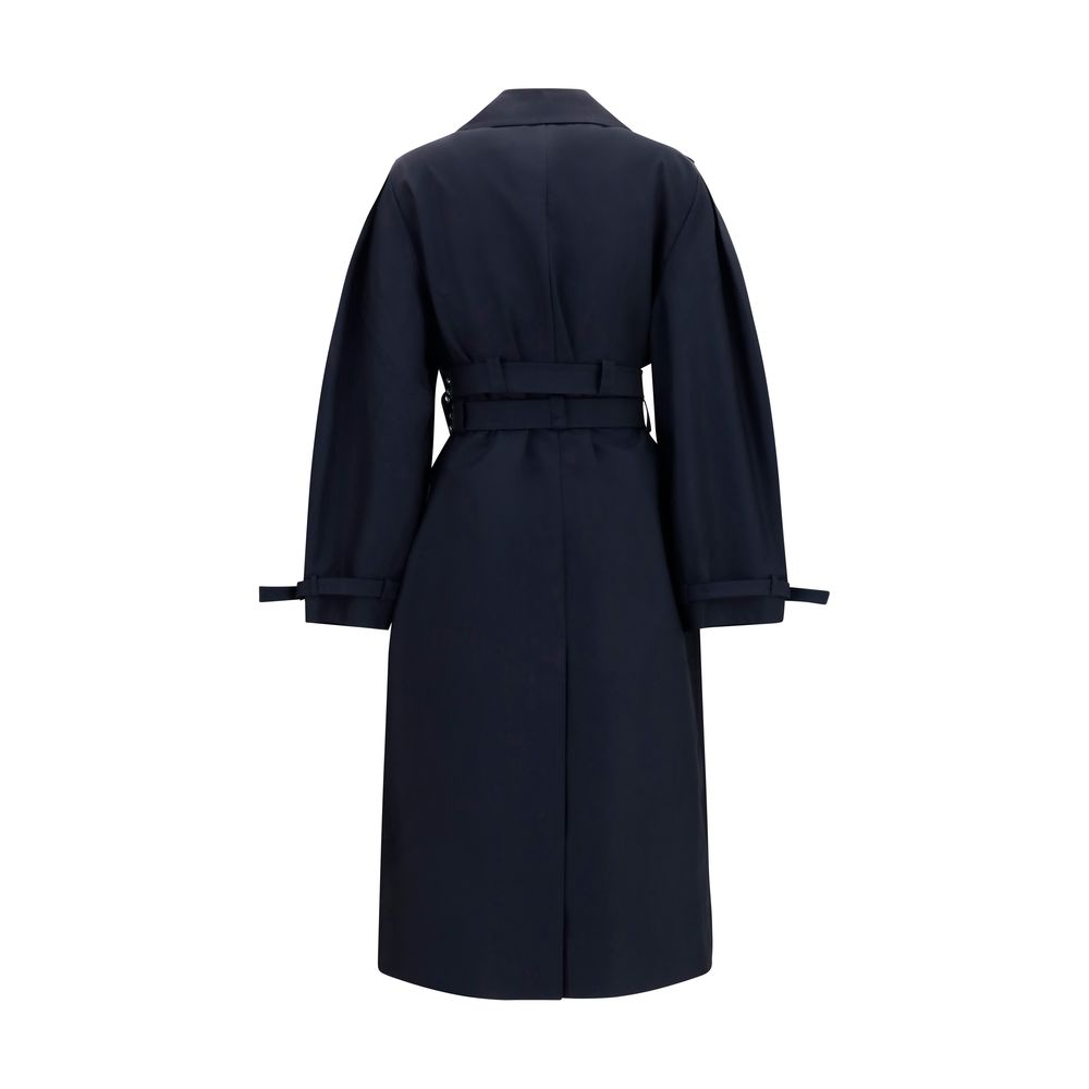 Trench Coat by Ganni for women in cotton black & signature presents a distinguished silhouette, artfully detailed with pockets and a distinguished for a sophisticated, distinguished finish.