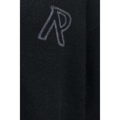 Cardigan by Represent for men in nylon merino & alpaca wool black presents a textural silhouette, artfully finished with a textural v-neck neckline and for a sophisticated, textural look.