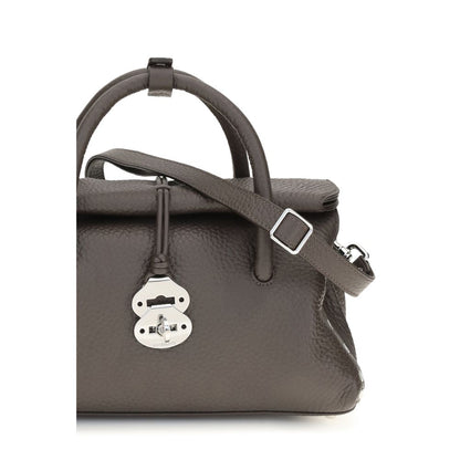 Shoulder Bag by Zanellato for women in bos taurus calf leather brown showcases a enviable silhouette, artfully detailed with a secure hook, organized built-in-compartments, and versatile shoulder-strap, handle & adjustable-strap for a enviable look.