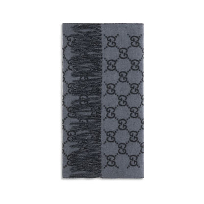 Scarf by Gucci for men in cashmere & capra leather blue & patterned showcases a on trend silhouette, artfully capturing the on trend essence of the Gg Cashmere & Capra Leather Foulard Fringes Scarf design with a sophisticated finish.
