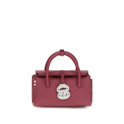 This Handbag by Zanellato for women in bos taurus calf leather and multicolor presents a sculptural silhouette featuring a secure magnetic, buckle & roll-top, ample , and versatile shoulder-strap & adjustable-strap for a sculptural finish.
