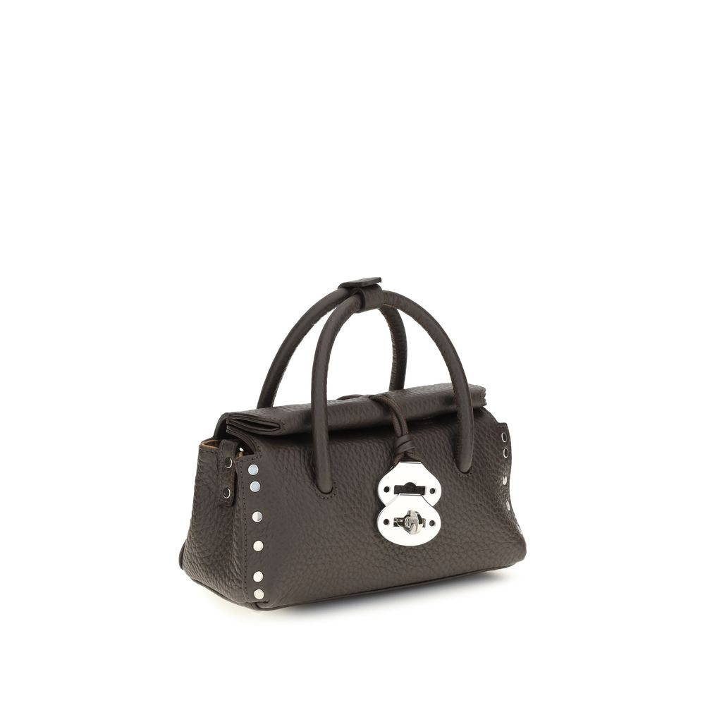 Handbag by Zanellato for women in bos taurus calf leather brown features a refined silhouette, showcasing a secure magnetic, buckle & roll-top, organized , and versatile shoulder-strap & adjustable-strap for a refined finish.