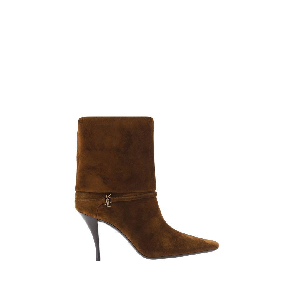 High-Heel Stiletto Ankle Boots by Saint Laurent for women in bos taurus calf suede leather brown & signature features an enchanting design from the Vicky Women's Bos Taurus Calf Suede Leather High-Heel Stiletto Ankle Boots collection, highlighting a enchanting stiletto high-heel and pointed toe style for a refined look.