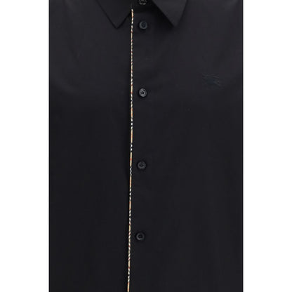 Dress Shirt by Burberry for men in cotton black presents a discerning silhouette, showcasing a sophisticated and for a truly discerning finish.