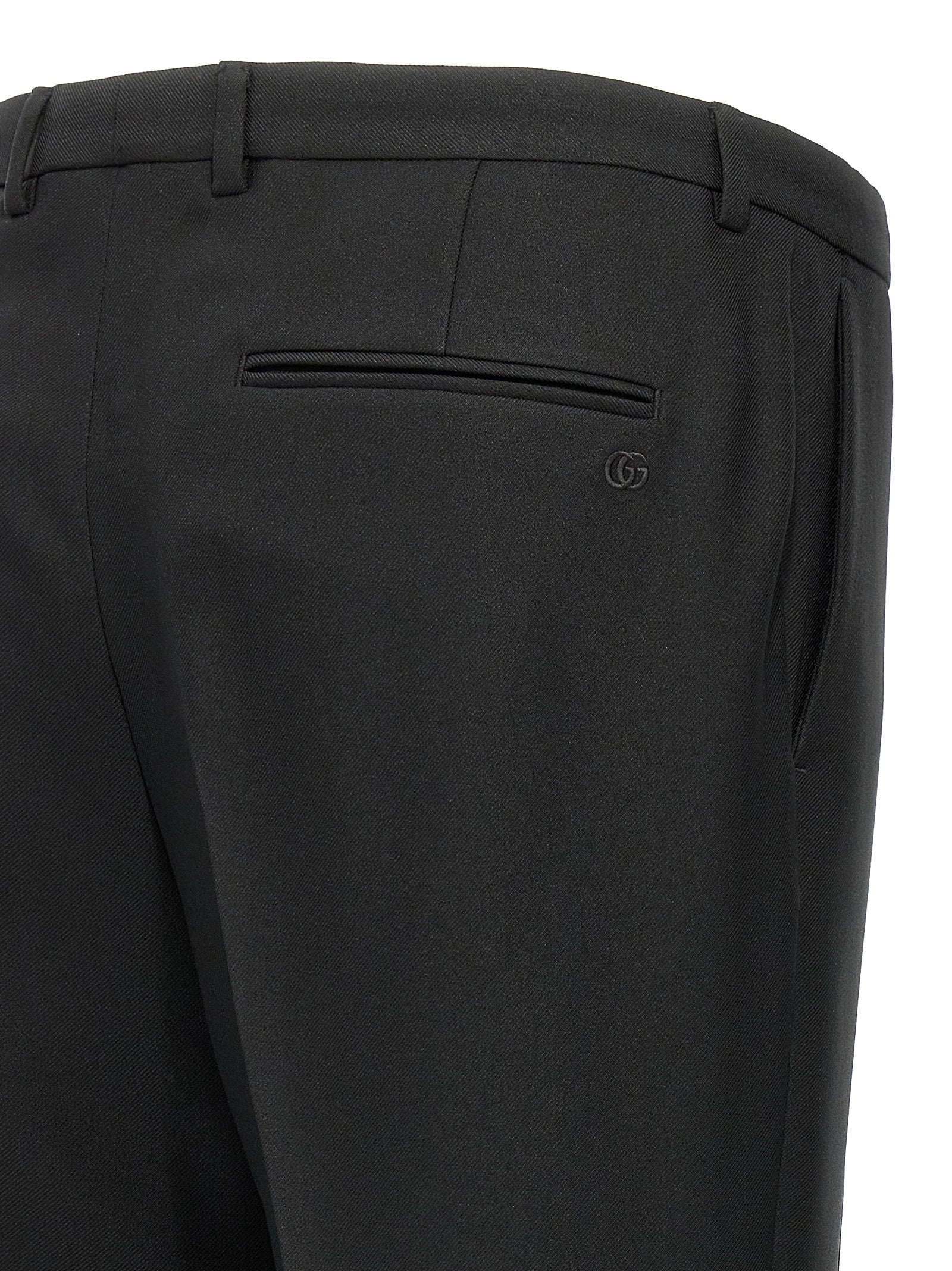 Casual Pants by Gucci for men in polyester twill black features a polished silhouette with a polished , reaching a polished long and finished with a polished .
