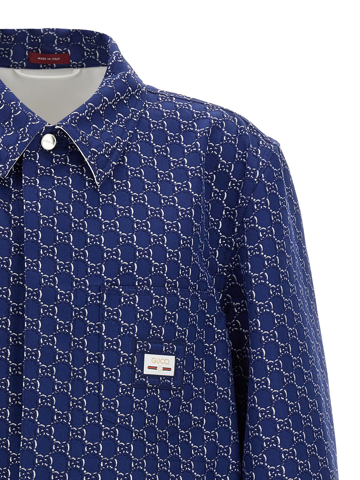 Jacket by Gucci for men in cotton blue, patterned & jacquard showcases a contemporary silhouette, detailed with a contemporary and premium pockets for a sophisticated finish.