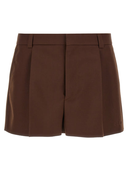 Bermuda Shorts by Gucci for men in wool viscose twill brown presents a sleek silhouette, featuring a sleek with a refined short and a sophisticated .