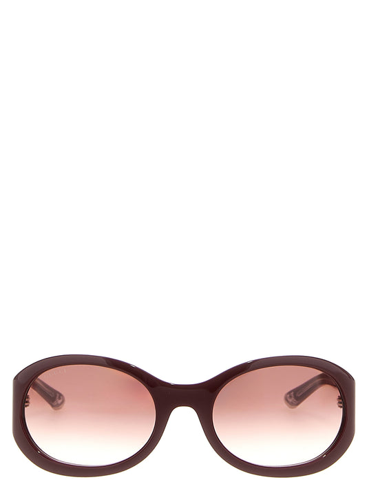 This Sunglasses by Gucci for women in bos taurus calf suede leather gradient & bordeaux presents a sumptuous silhouette, showcasing a sumptuous round frame design in and high-performance gradient lens.