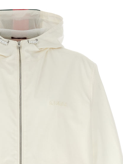 Hooded Windbreaker Jacket by Gucci for men in cotton white & print features an perennial silhouette with a refined hooded neckline and perennial pockets, hooded & windproof for a sophisticated weather-resistant look.