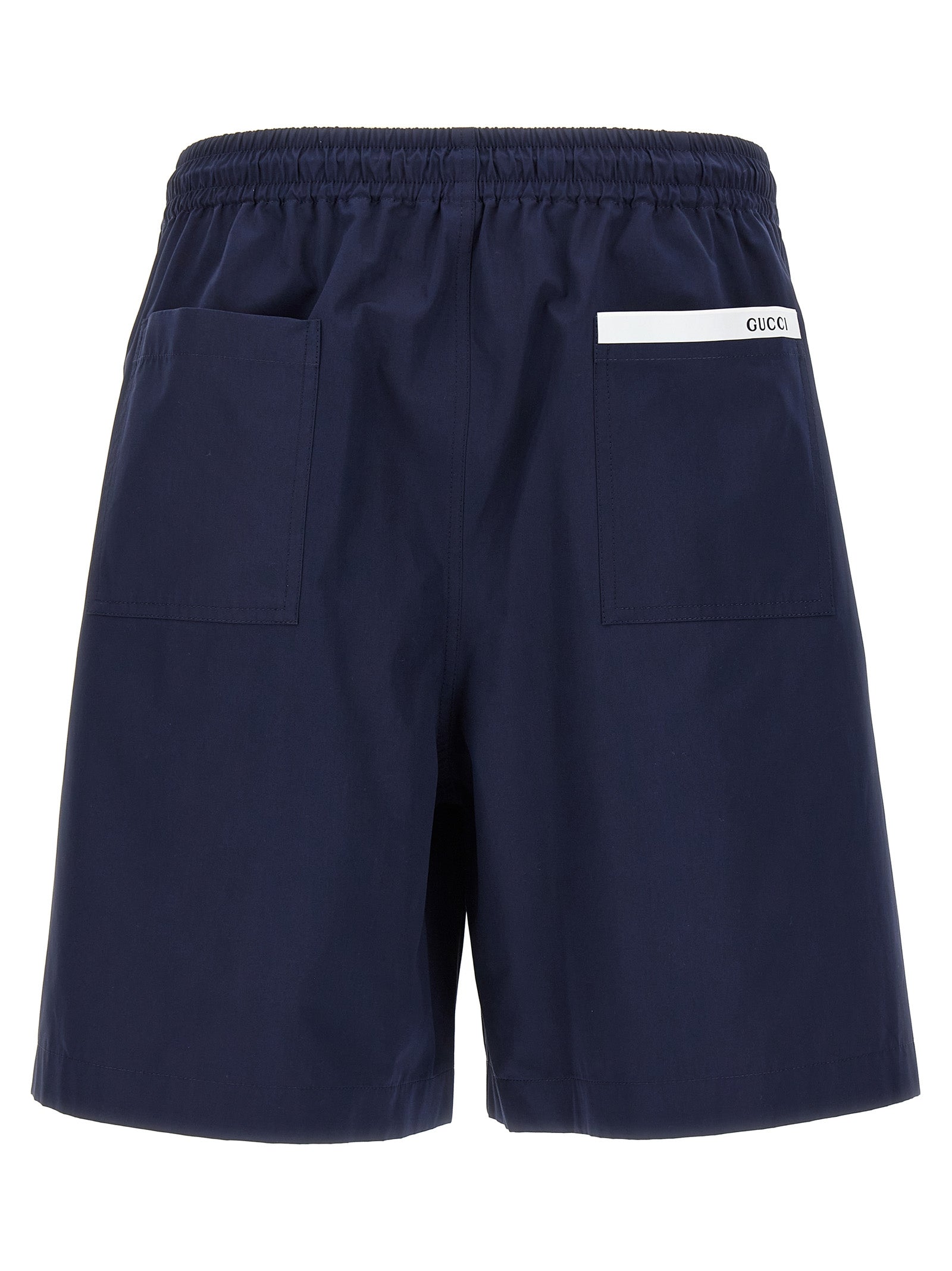 Bermuda Shorts by Gucci for men in cotton blue & signature features an nuanced silhouette, showcasing a nuanced relaxed-fit with a short cut and for a sophisticated, premium finish.