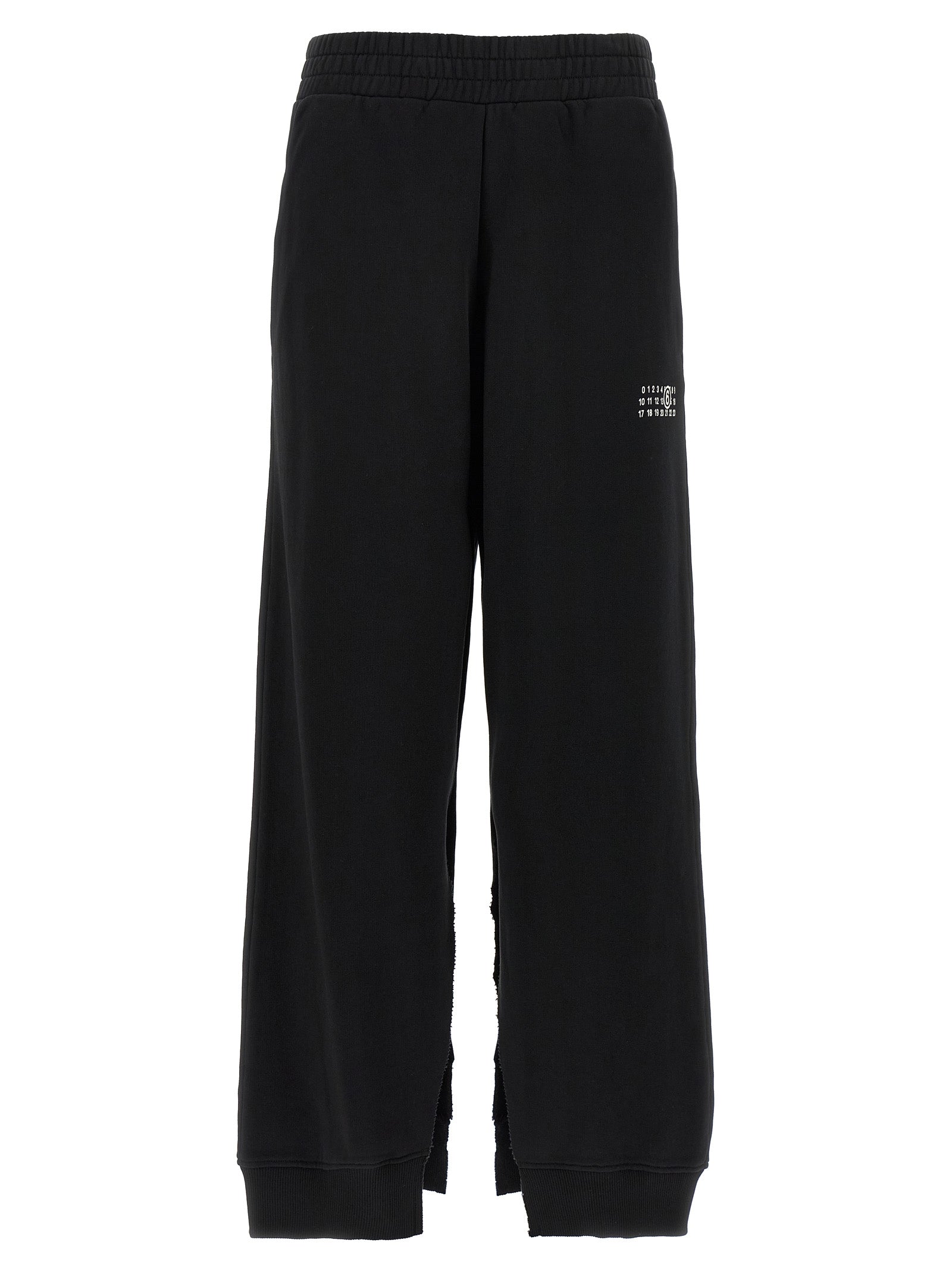 Joggers by MM6 Maison Margiela for women in cotton black, white, signature & print features a refined silhouette with a refined wide, defined by a high rise and a refined long for a refined finish.
